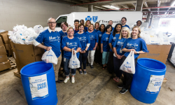 BlueCross employees load donations they collected for the Chattanooga Area Food Bank