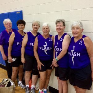 Mary Tim Burgen with her basketball team