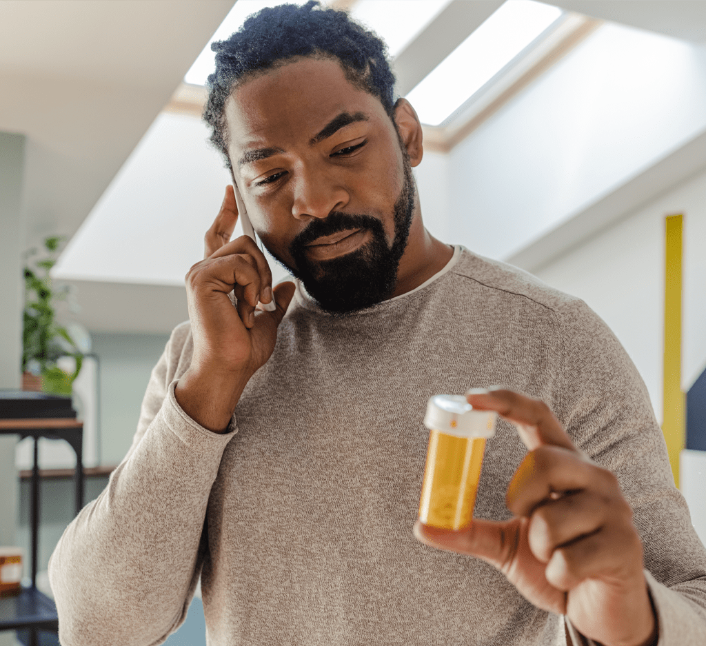 Man on telehealth call asking about medication