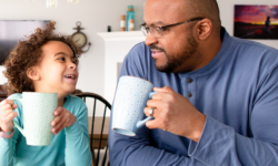 Father having coffee with daughter
