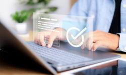 Customer service person validating digital documents using futuristic interface with checkmark icons, quality assurance system, compliance review, and document verification.