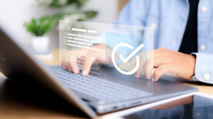 Customer service person validating digital documents using futuristic interface with checkmark icons, quality assurance system, compliance review, and document verification.